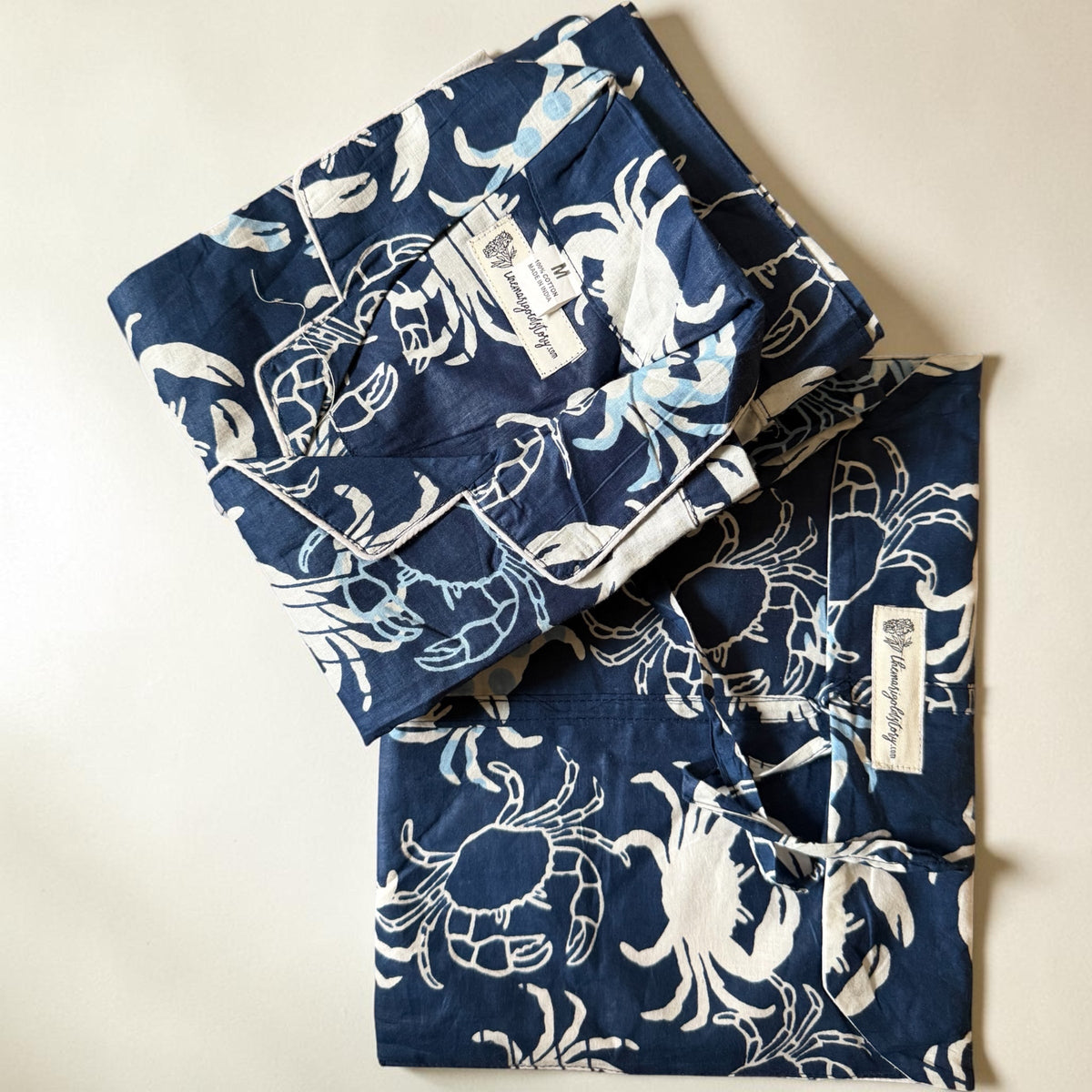 The Marigold Story navy blue cotton pyjama set featuring a white and sky blue hand block printed crab pattern.