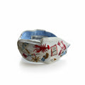 The Marigold Story white headband featuring hand-embroidered coastal motifs like a lobster, beach chair, and umbrella.